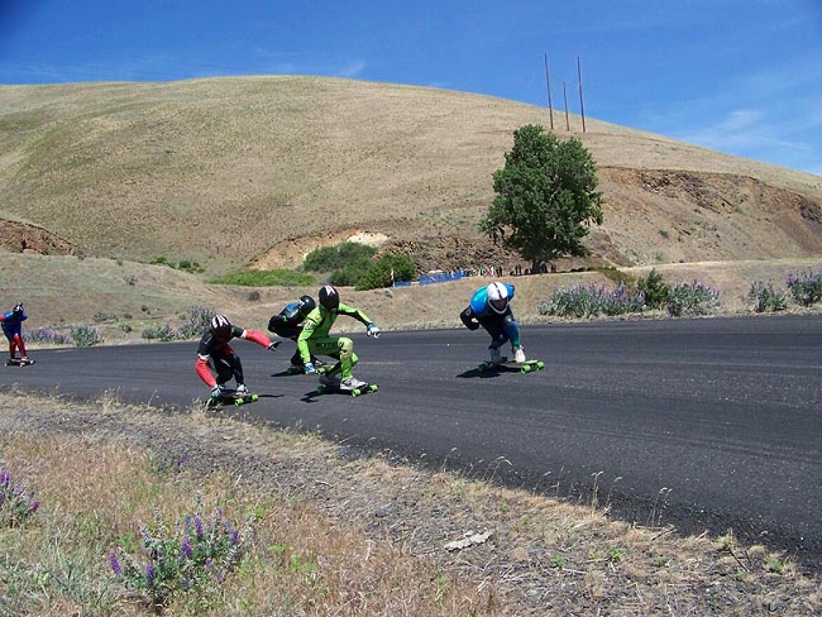 Racers jostle and draft for position in the first turns of Maryhill Loop Road in the Columbia River Gorge. Photo by Anna King